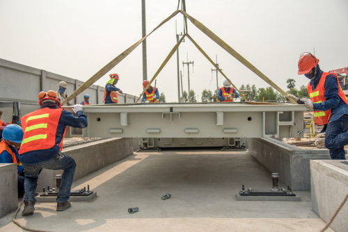 Construction,Worker,In,Stall,Truck,Scale,Structure,In,Construction,Site